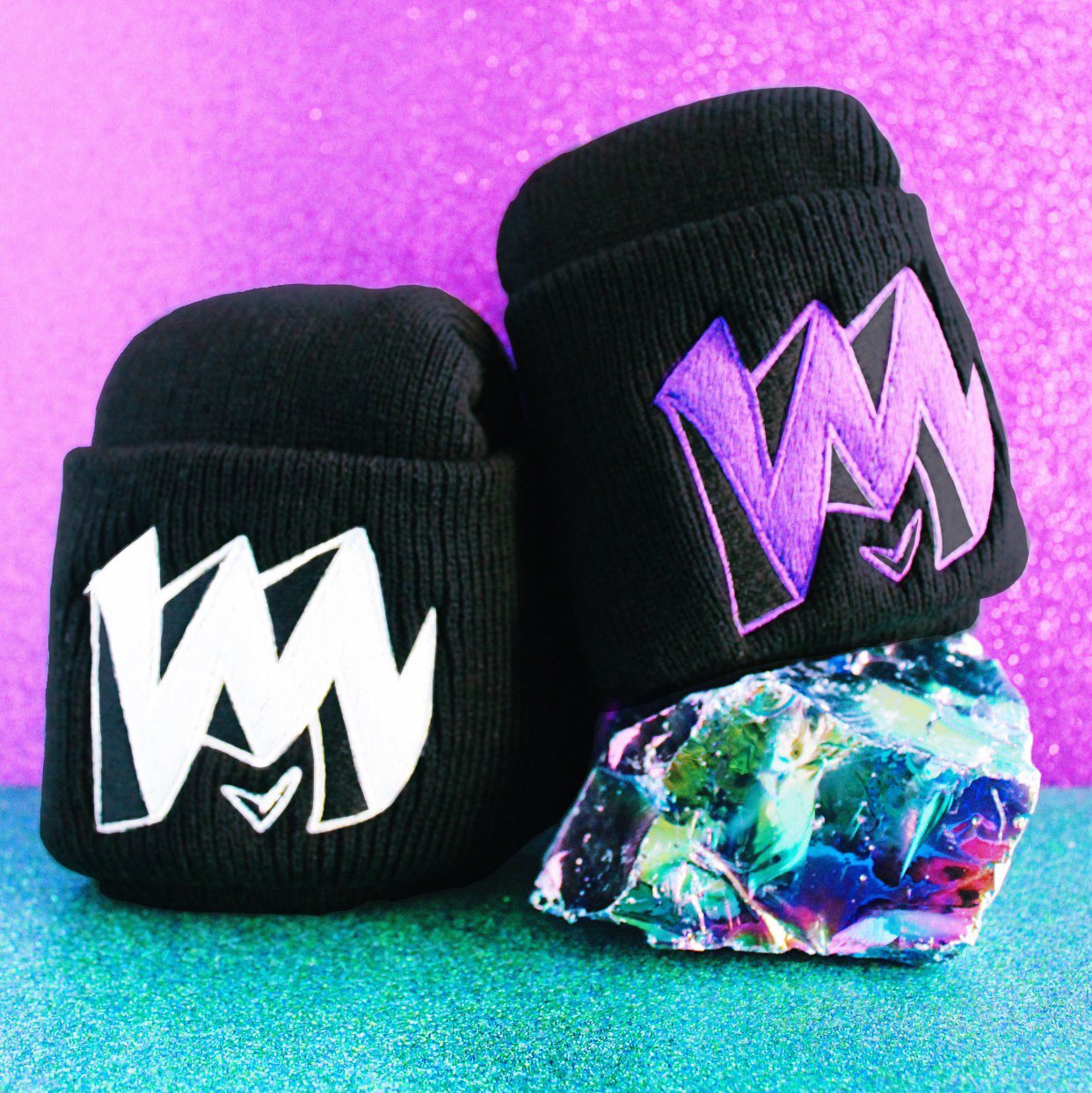 Collection of HeyMezzy apparel and beanies